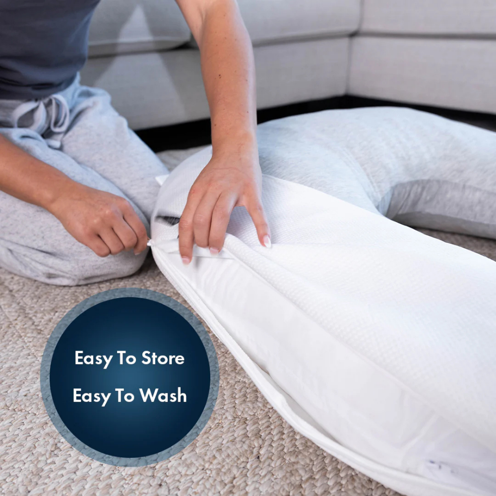 Hands unzipping the Hugl pillow cover; icons read Easy to Store and Easy to Wash
